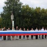 Единороссы Уйского района приняли участии в мероприятии, приуроченному ко Дню Государственного флага Российской Федерации