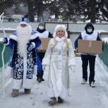 Партийцы привезли сладкие подарки во все школы и детские сады Тасеевского района