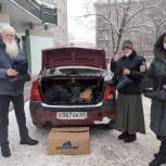 Юрий Сорокин передал псковскому детскому фонду более тысячи пар новой зимней обуви