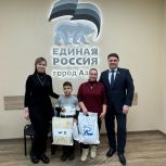 Депутаты Анна Касьяненко и Владимир Влазнев поздравили семью участника СВО с Днем защитника Отечества
