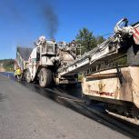 На трассе Коноша – Вожега дорожники приступили к укладке верхнего слоя