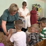 Партийцы Краснокутского района поздравили малышей с Днём защиты детей