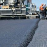 На улице Новая - Дружбы начались работы по укладке второго слоя асфальта