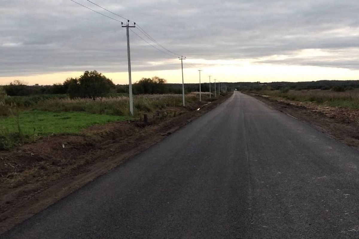 Автодорогу на въезде в поселок Турдеевск в Архангельске заасфальтировали