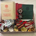 Единоросс передал родным героя его ордена и медали, найденные бойцами РФ в курском приграничье