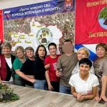 Член совета сторонников партии получила медаль из рук участника СВО