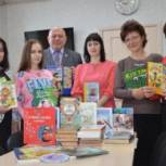 Активисты Партии отдали в дар районной библиотеке более 200 детских книг 