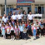 В рамках акции «Собери ребенка в школу» 200 семьям Дербентского района переданы портфели и школьные принадлежности
